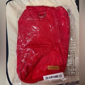 Super cute, medium sized red sweatshirt with leash clip for small dog has a hood